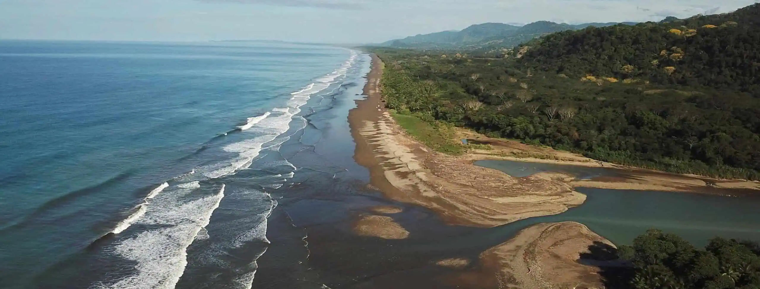 Rio baru running into the pacific ocean